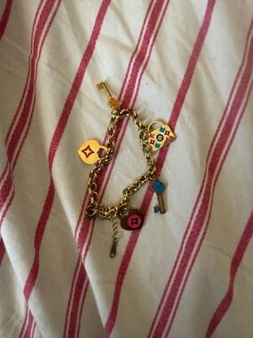 Gold Tone Charm Bracelet with Colorful Enamel Charms